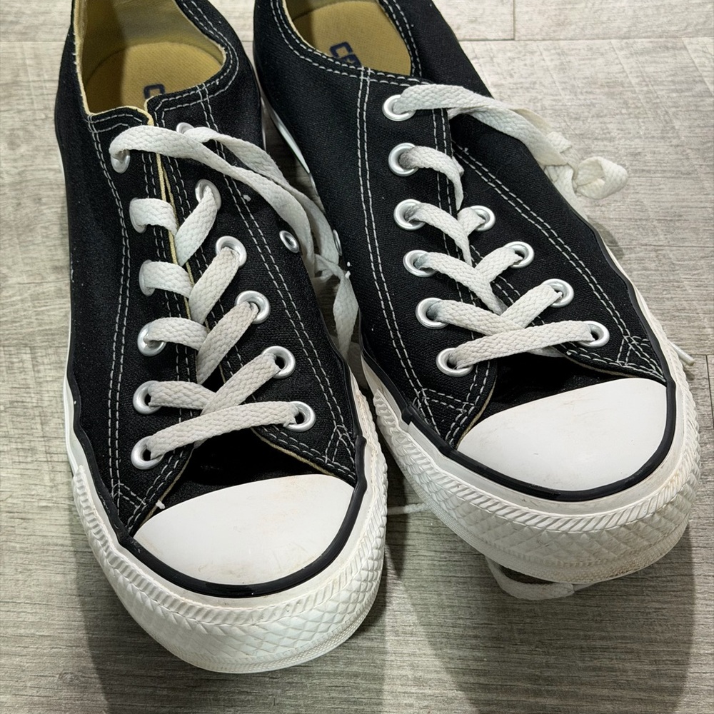 Stylish Black Sneakers with White Laces